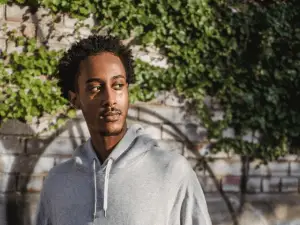 confident young black man on street