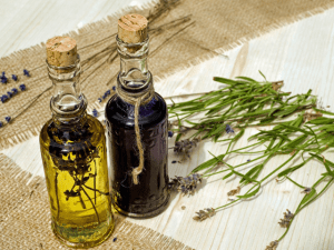 Bottled essential oils with grass