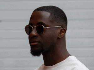 black man in white shirt and eyeglasses