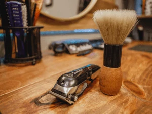 brown brush and black razor