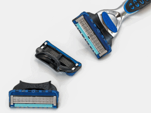 blue and silver razor with blades