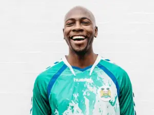 happy man wearing green shirt