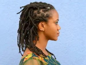 Sideview of a woman with dreadlocs