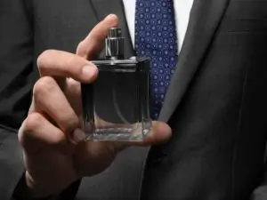 man in suit with cologne