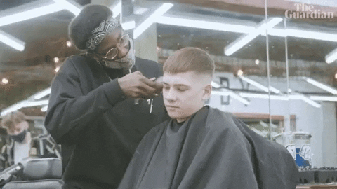 Barber and young customer