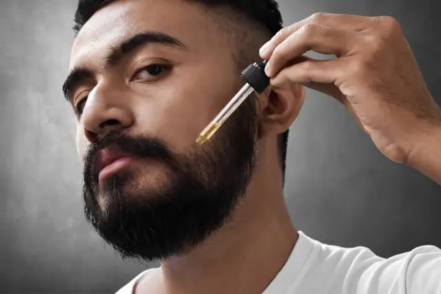 applying beard oil