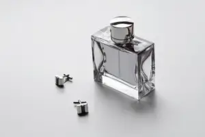 bottle of cologne and cufflinks - featured image